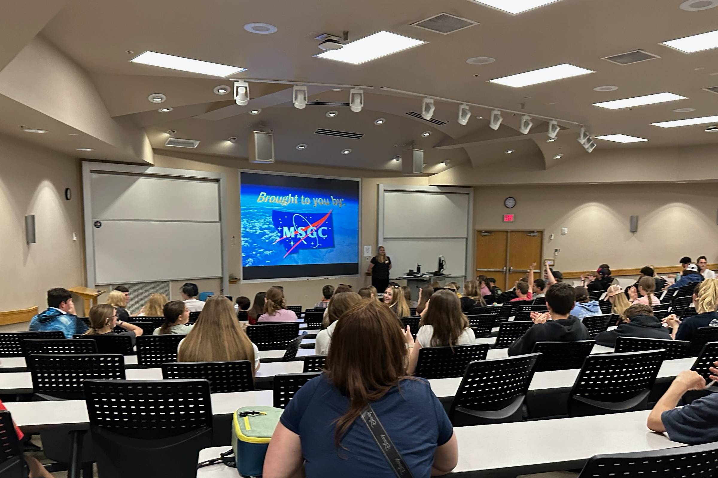 hands typing on a laptop